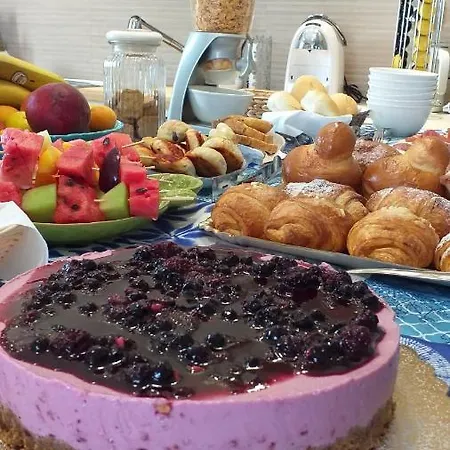 לינה וארוחת בוקר Ginevra פורטו צ'זראו